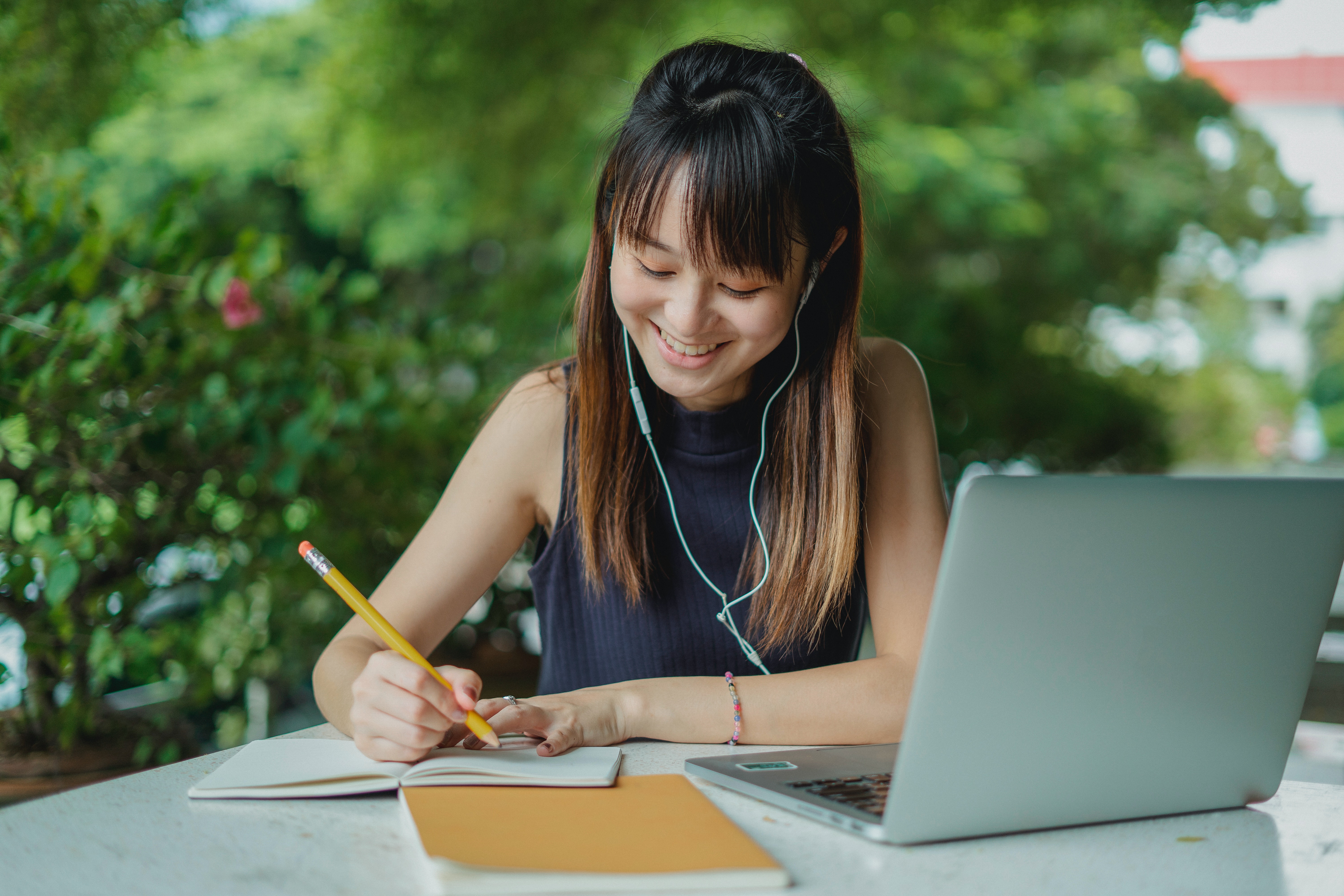 student studying with the help of laptop